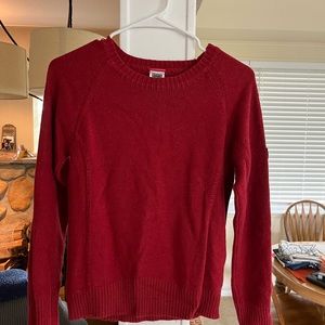 Red north face sweater